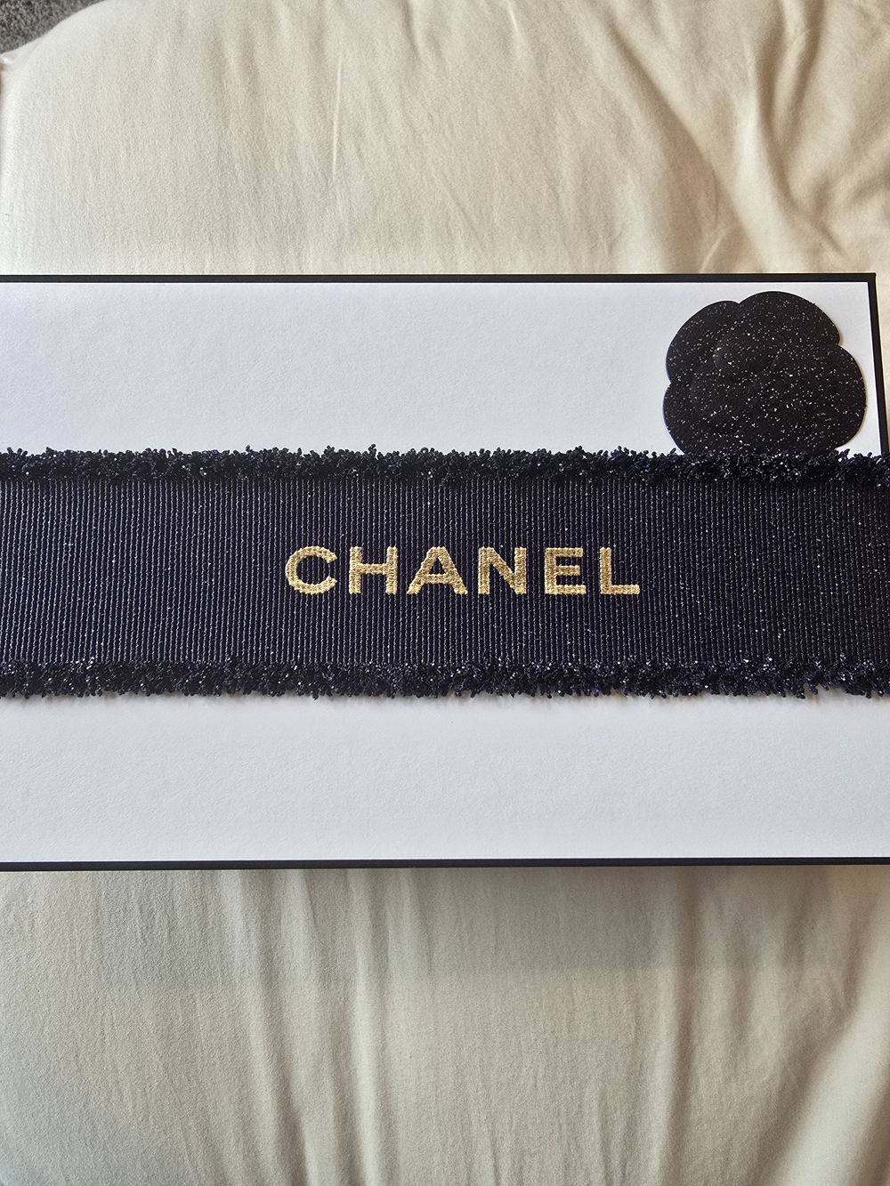 CHANEL Blue Ribbon with Gold CHANEL Logo